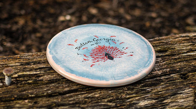 dalton peacock disc golf stamp ruth park king peacock mural creative arts guild